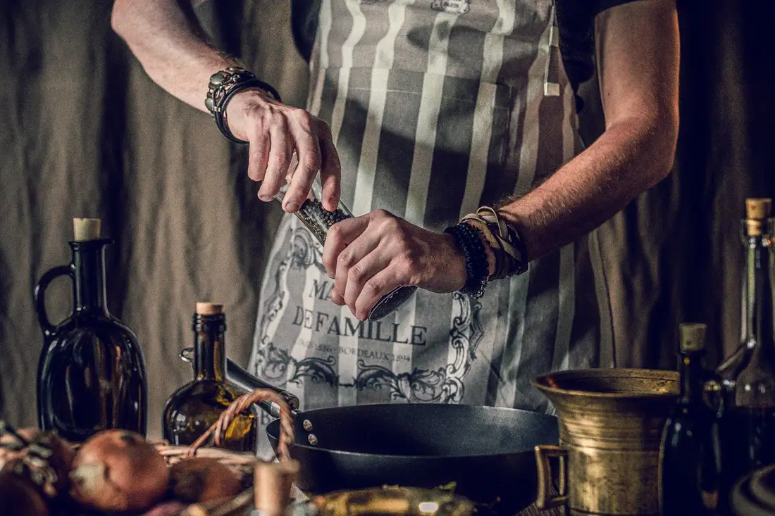 A finished apron worn in a kitchen